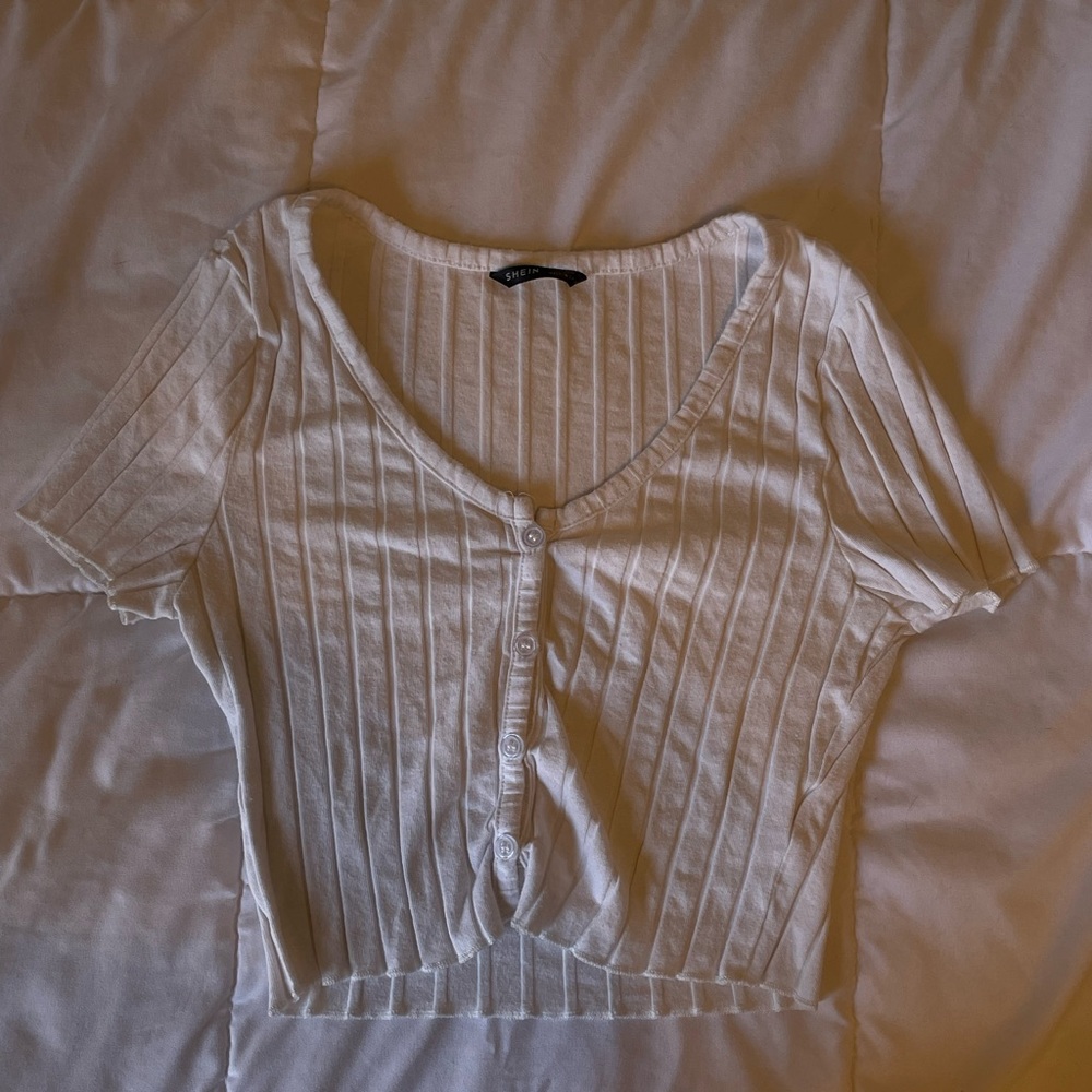 SHEIN white button up top.